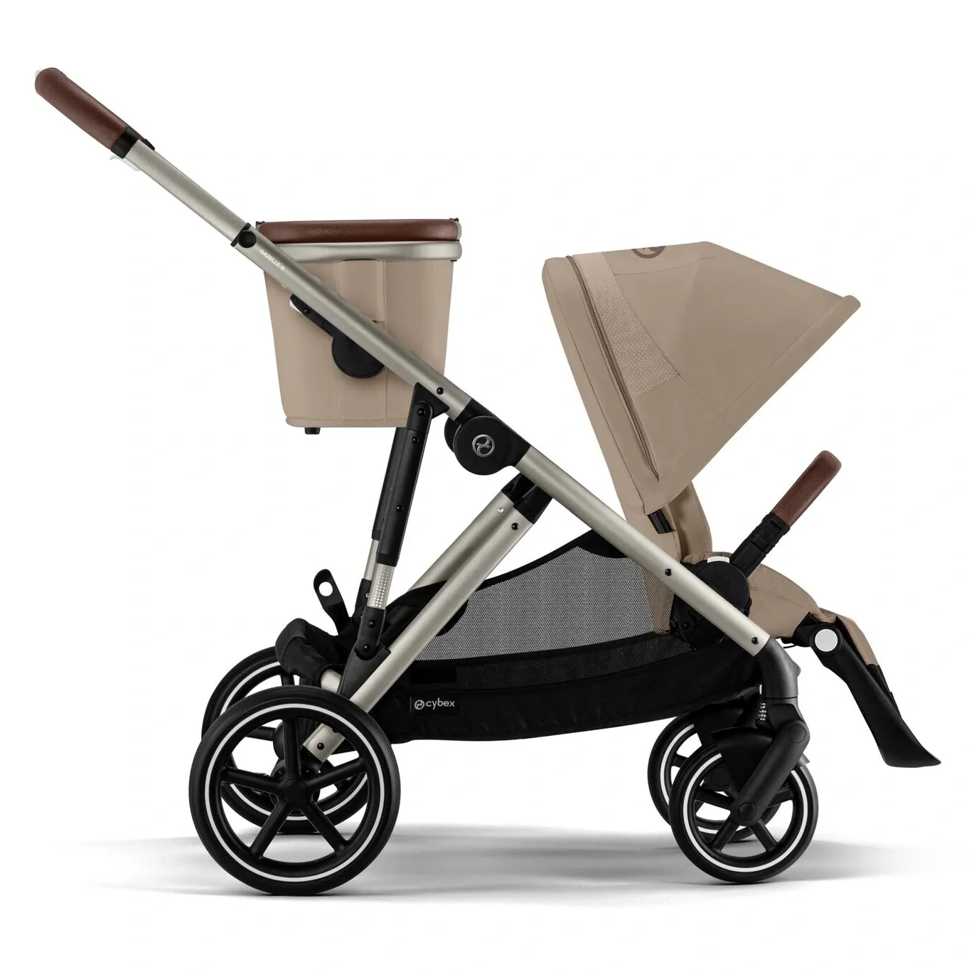 Cybex Gazelle S в профиль — бежевый прогулочный блок на шасси таупе